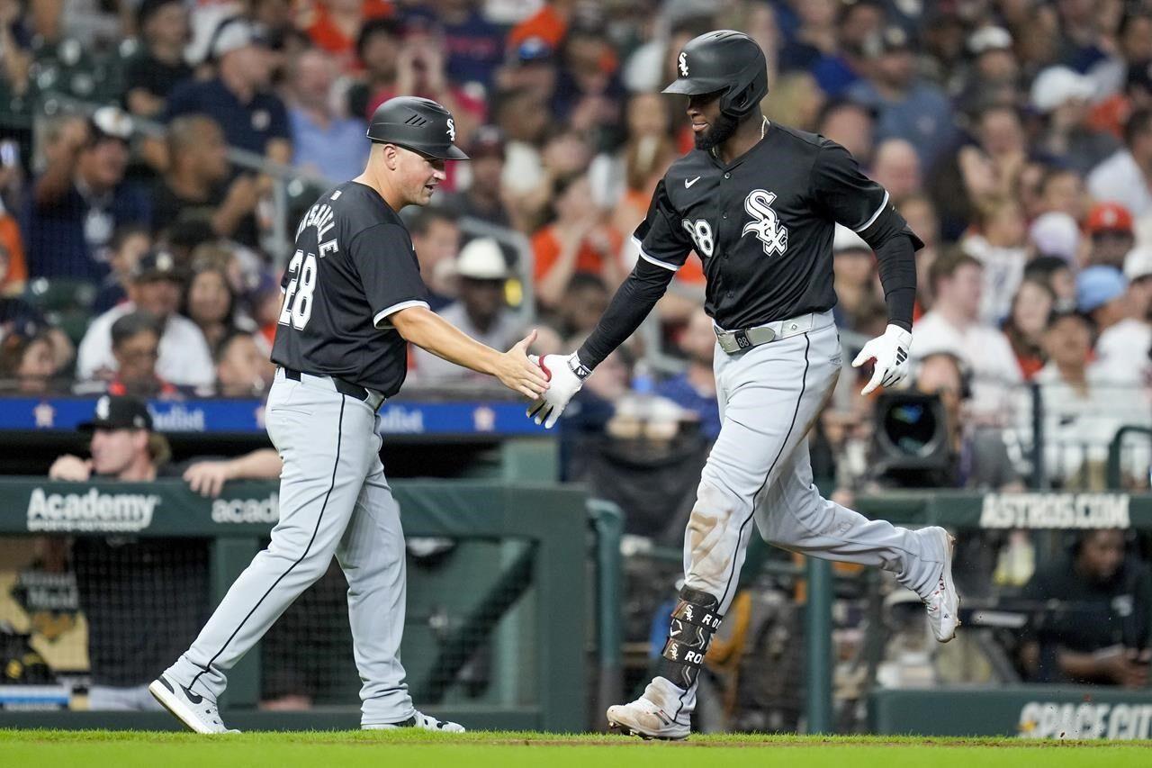 Robert homers twice on 4-hit night, lowly White Sox end Astros' streak with 5-4 victory